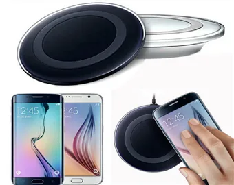 Black rectangular wireless charging pad with rounded edges, USB cable included