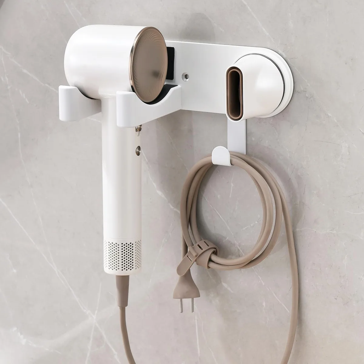 White wall-mounted hair dryer holder with magnetic slot and cord hook