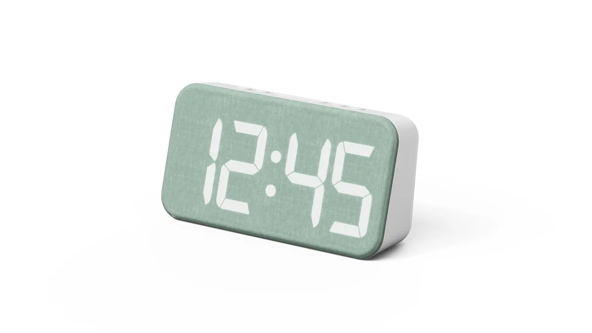 Deep green fabric-covered digital desk clock with LED display