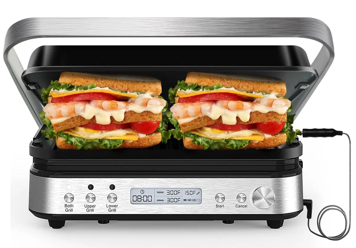 Silver stainless steel contact grill with removable reversible plates, open flat at 180 degrees