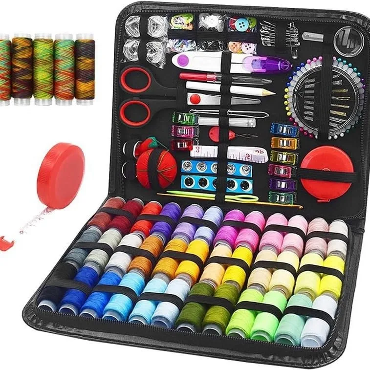 Compact fabric case holding 229 sewing pieces including 41 thread spools, scissors, needles and tape measures