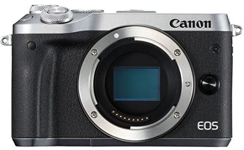 Silver compact mirrorless camera body with tilting 3.0 inch touchscreen