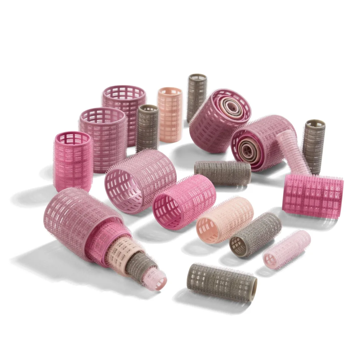 Pink, grey and purple self-grip hair rollers in a storage case