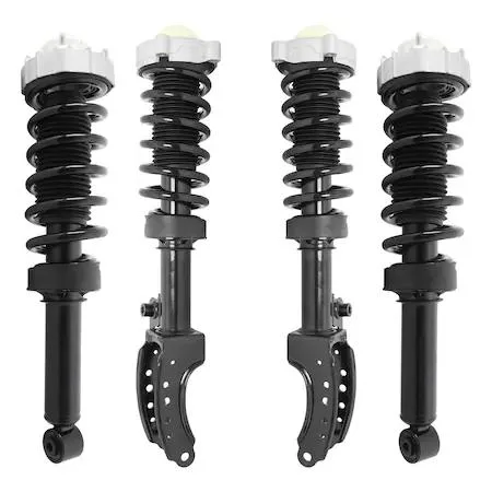 Boxed set of four silver strut assemblies with coil springs and top mounts