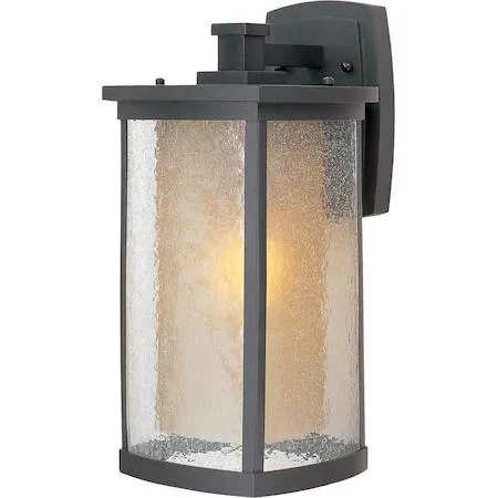 Bronze outdoor wall sconce with seedy glass shade