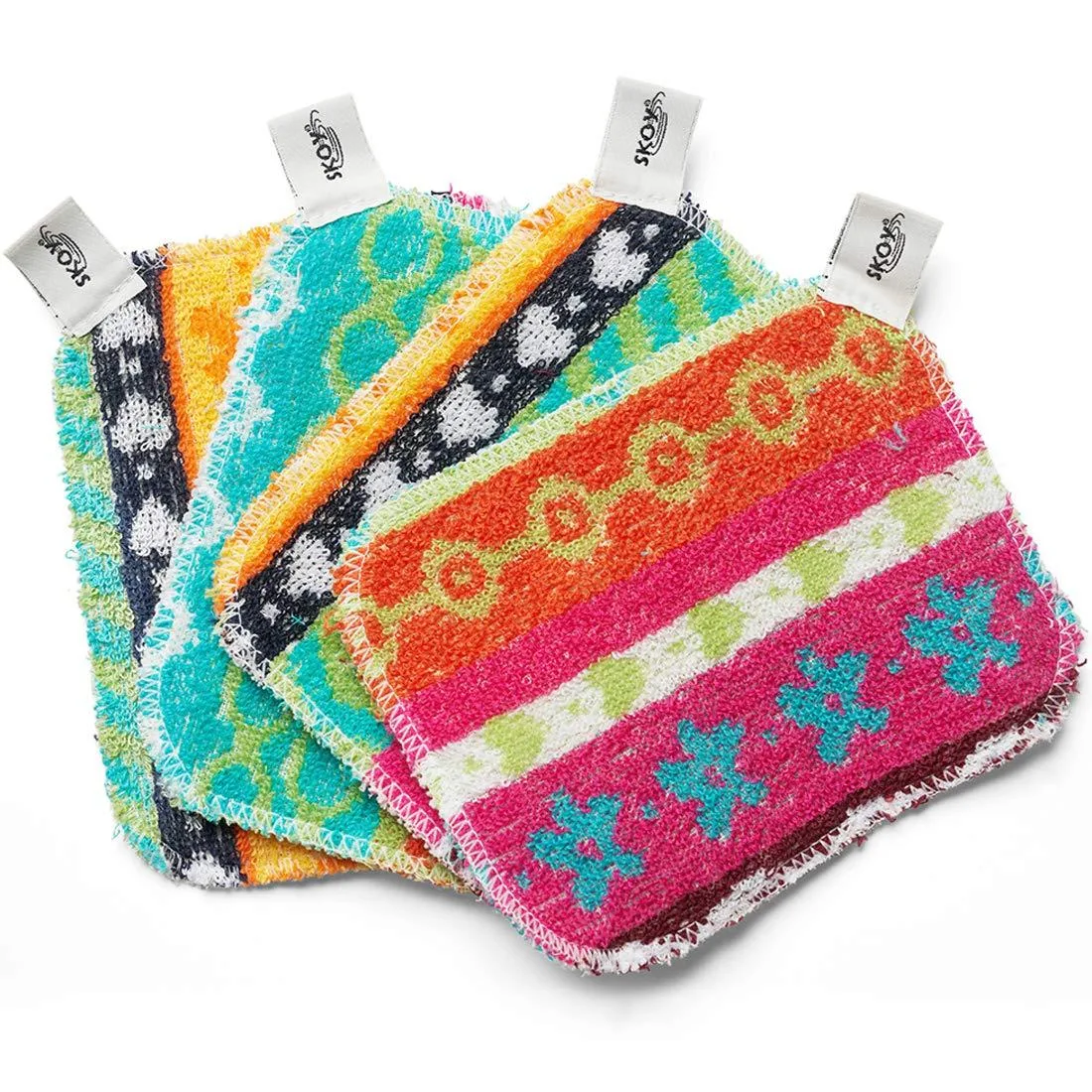 Four flat rectangular scrub pads in assorted colours lying flat