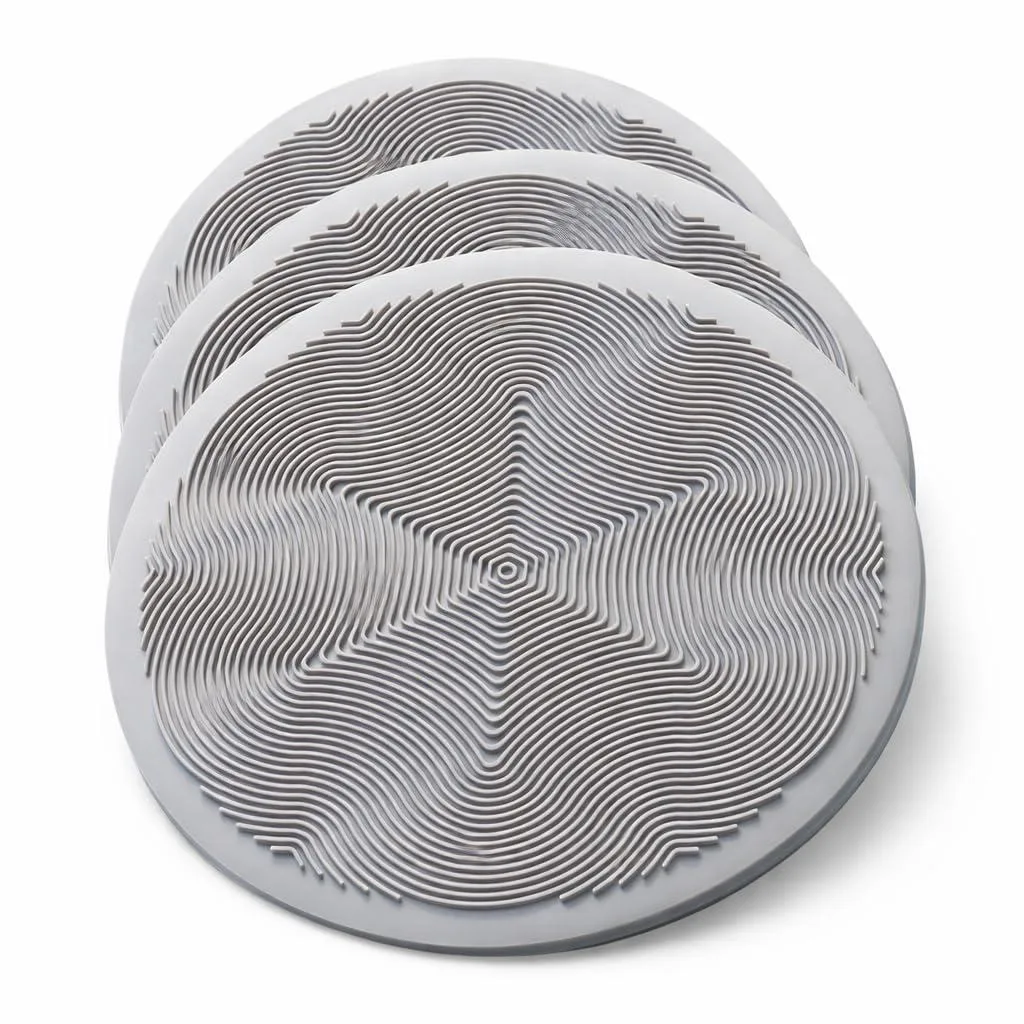 Three medium-grey 10in silicone mats with raised geometric pattern, thin and flexible