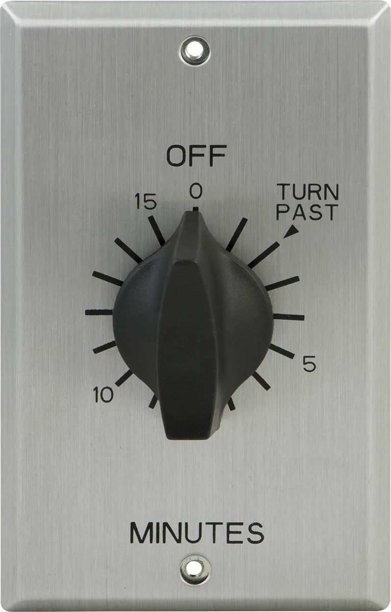 White in-wall mechanical countdown timer switch with rotary dial and metal wall plate