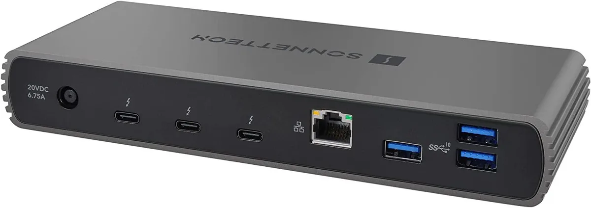 Silver rectangular desktop dock with Thunderbolt and USB ports, SD slot, power button and indicator light
