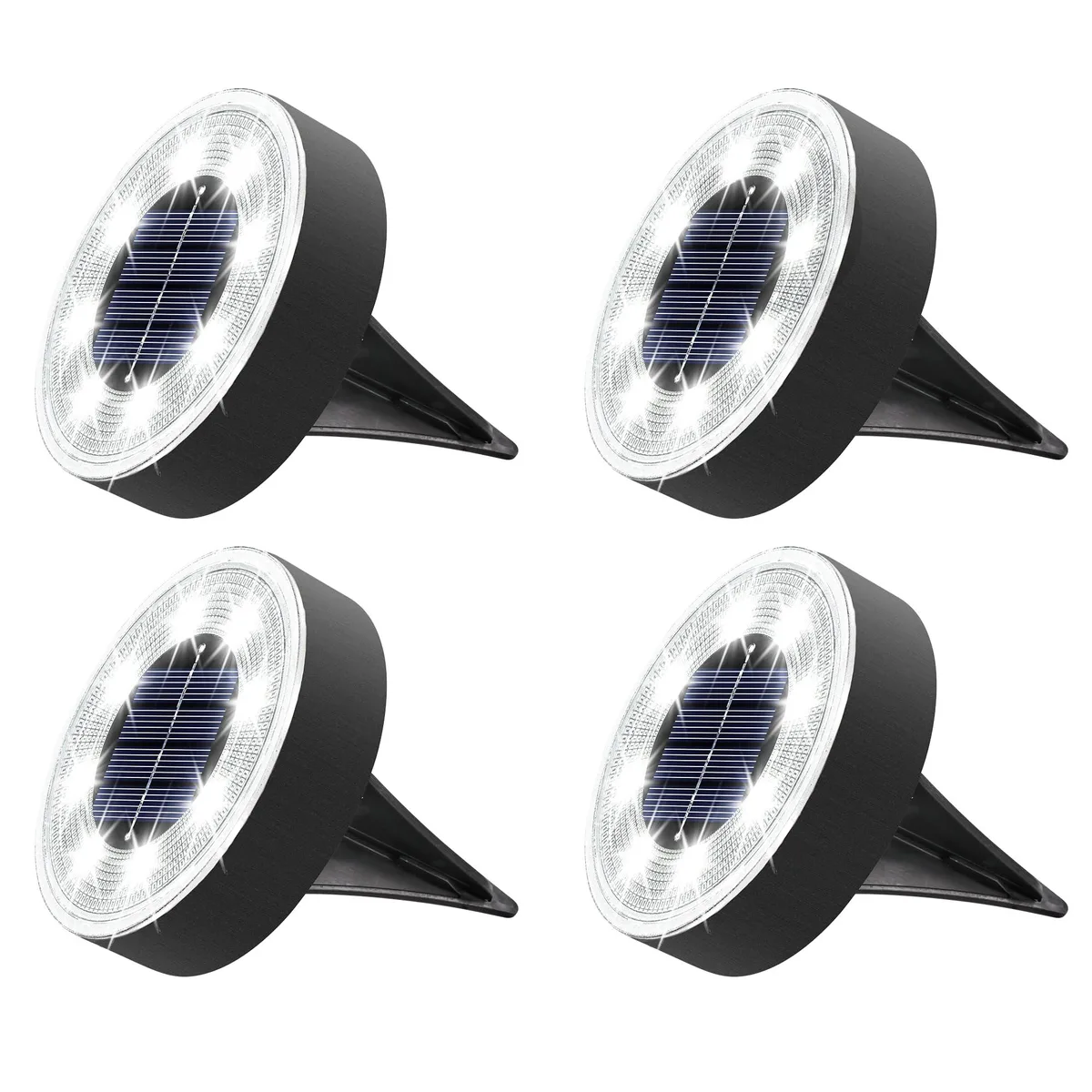 Four white plastic disc lights with ground stakes, solar panels on top, polished chrome finish