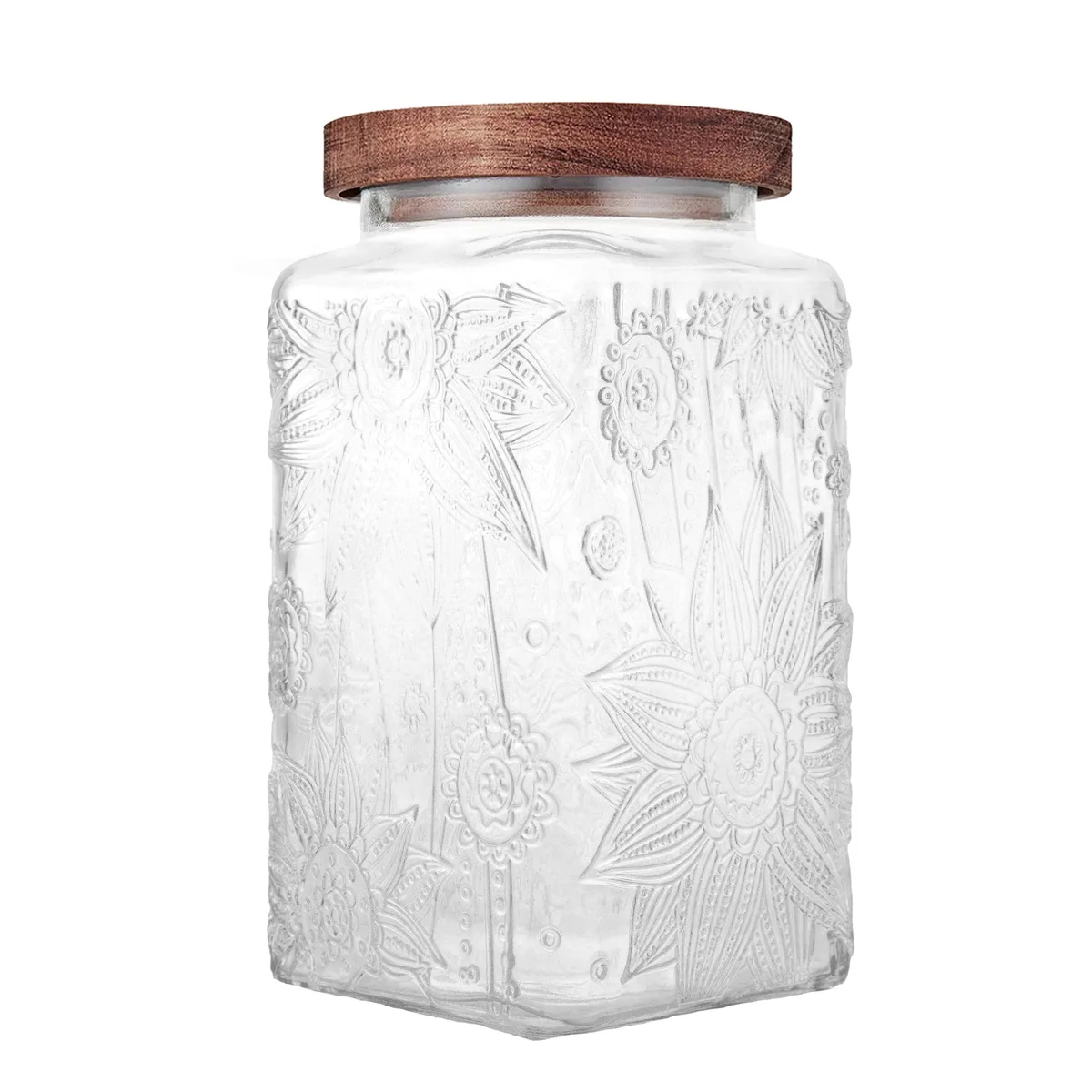 Clear square glass jar with sunflower relief pattern and natural wood lid, 3.85 inches wide by 7 inches tall