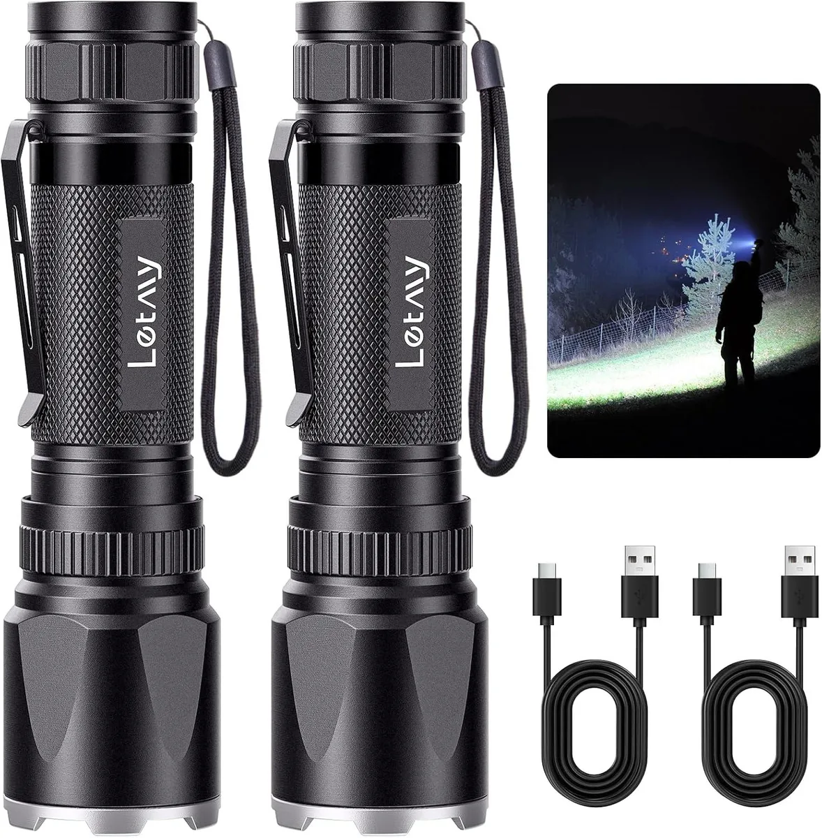 Two black cylindrical flashlights with pocket clips lying side by side