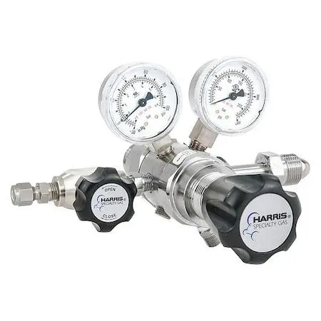 Brass two-stage gas regulator with pressure gauges and control knob
