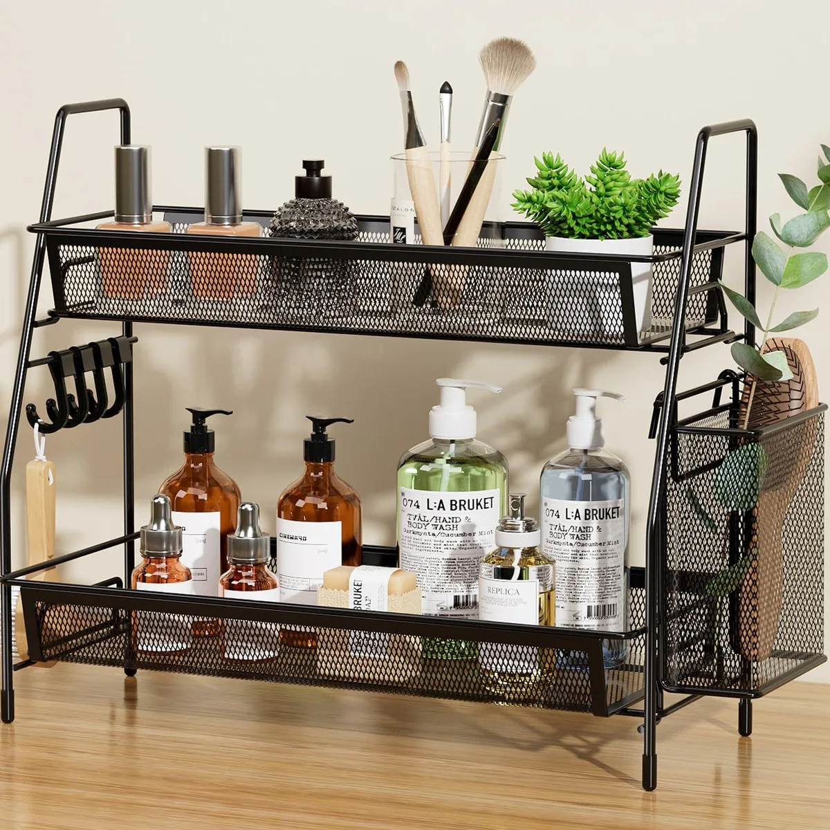 Black metal wire mesh two-tier countertop organizer with side basket and four hooks