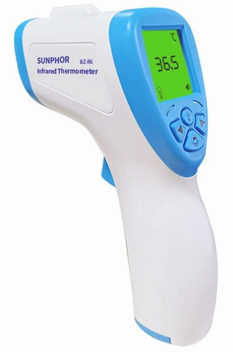 White handheld forehead thermometer with infrared probe and display