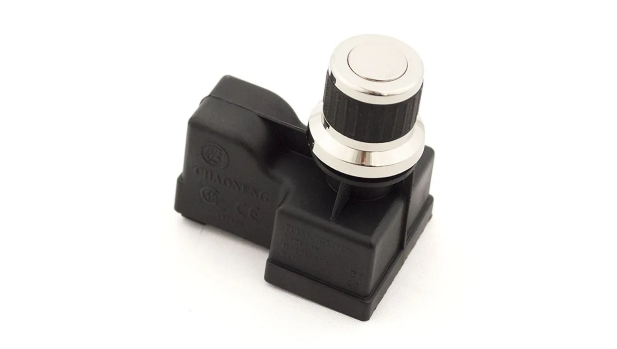 Small rectangular black plastic ignition module with wire terminals