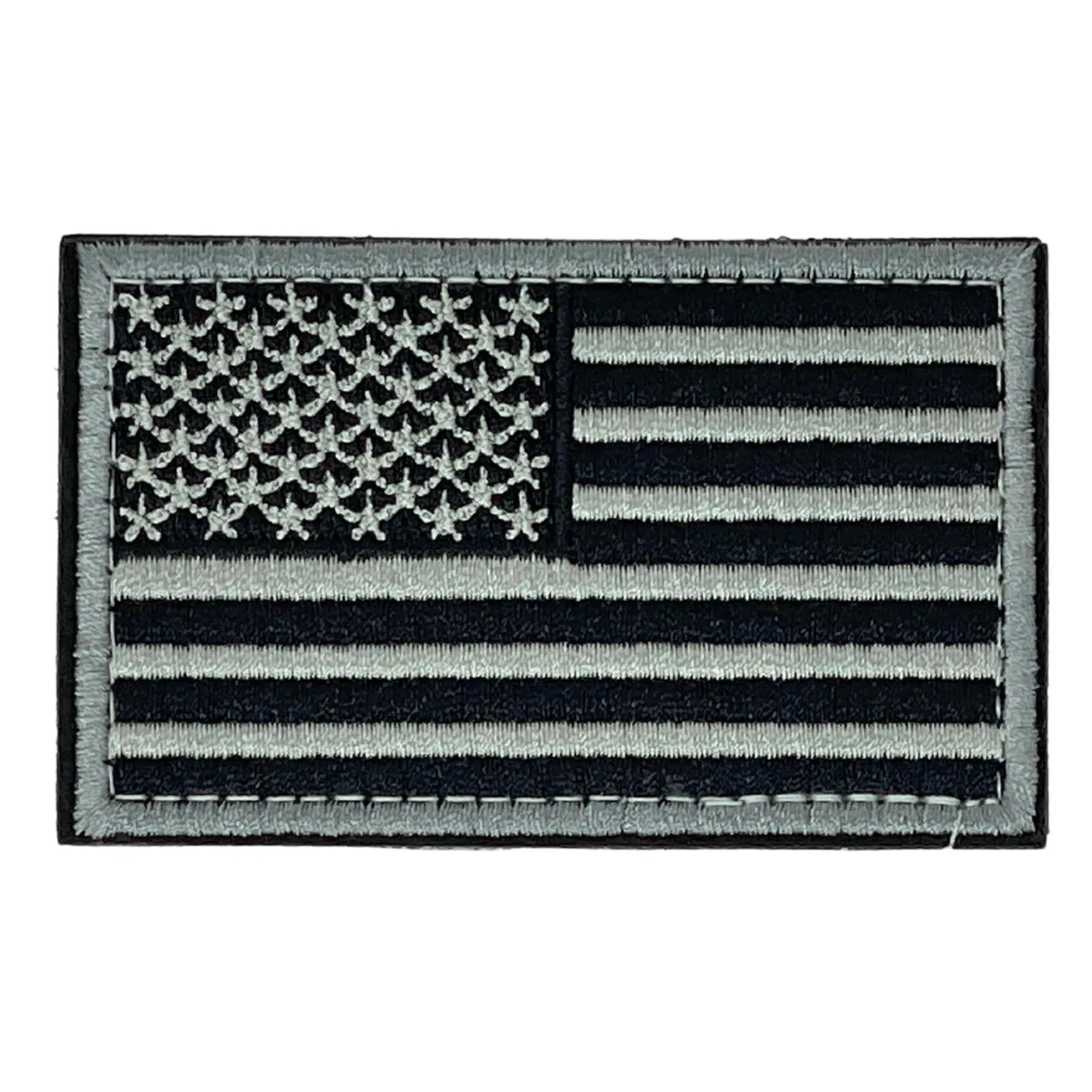 Grey embroidered USA flag patch with detachable backing, two by three inches