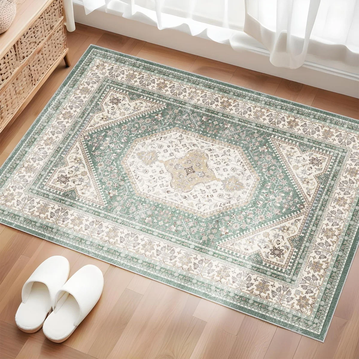Rectangular green and beige rug with vintage floral pattern, low pile, non-slip backing