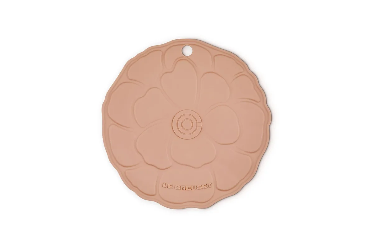 Silicone petal trivet in peach colour, eight inches round