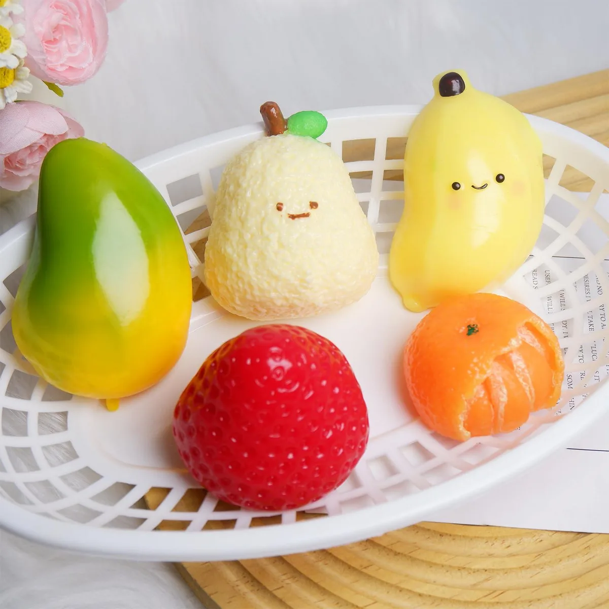 Five handmade fruit squishies in bright colours, soft TPR material