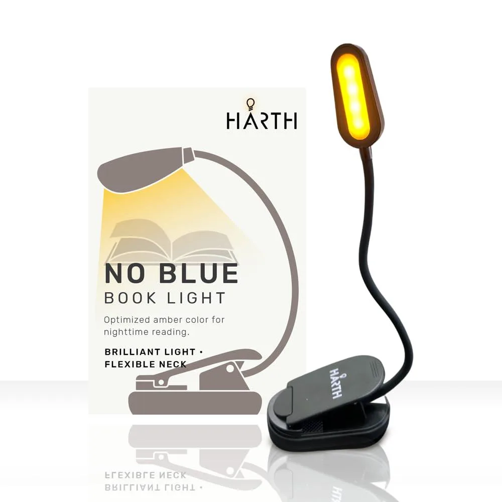 A clip-on amber book light with a warm glow and rechargeable battery