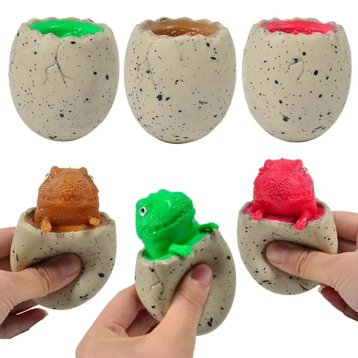 Three colourful dinosaur egg squeeze toys with pop-out heads