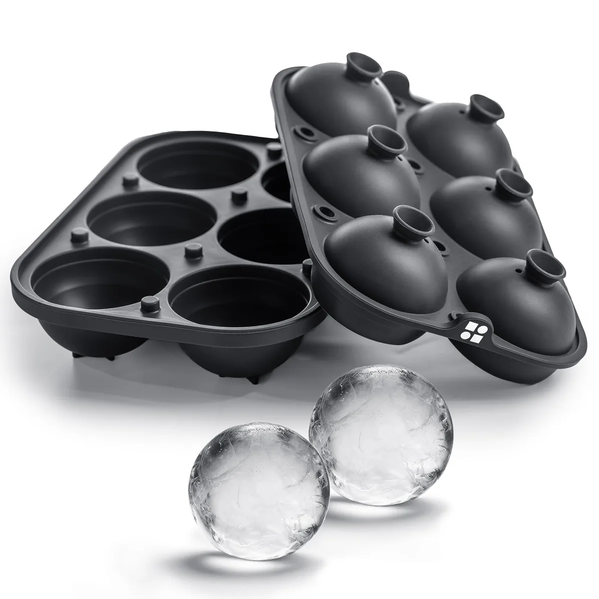 Grey silicone tray with six round cavities and a small funnel, 8.5 by 6.75 inches