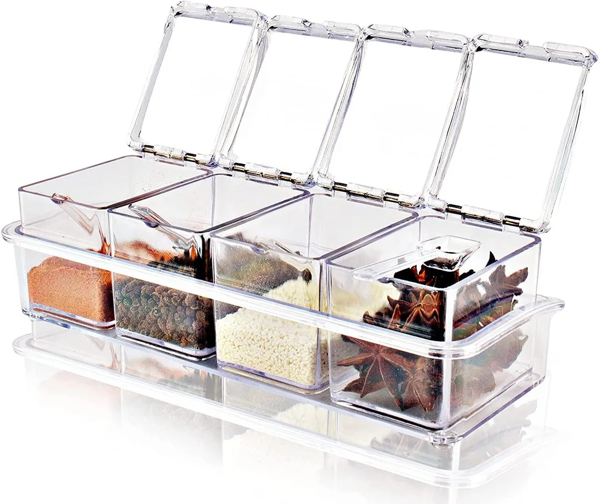Four red acrylic spice jars with spoons on a non-slip tray