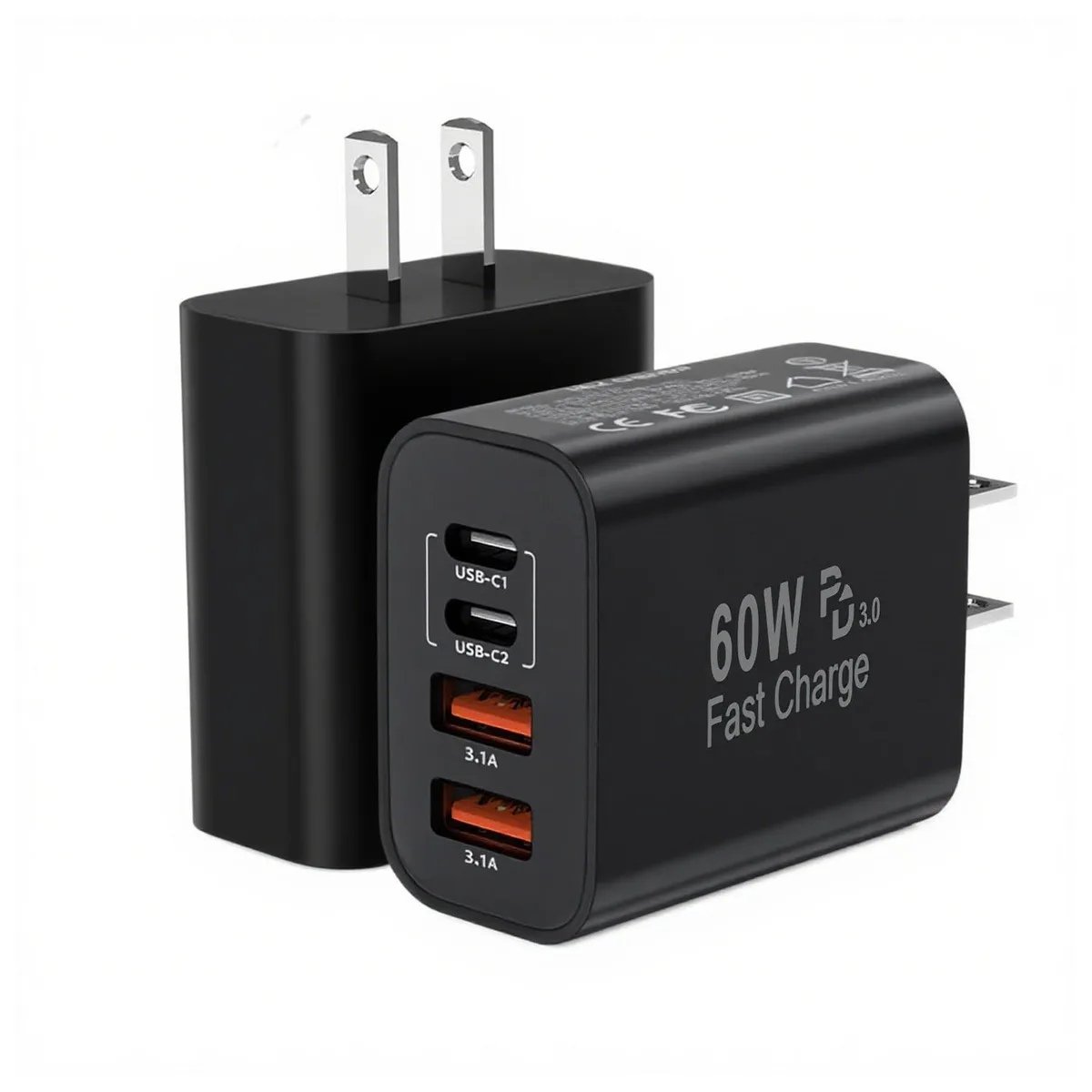 Two black cube-shaped chargers each with two USB-C and two USB-A ports