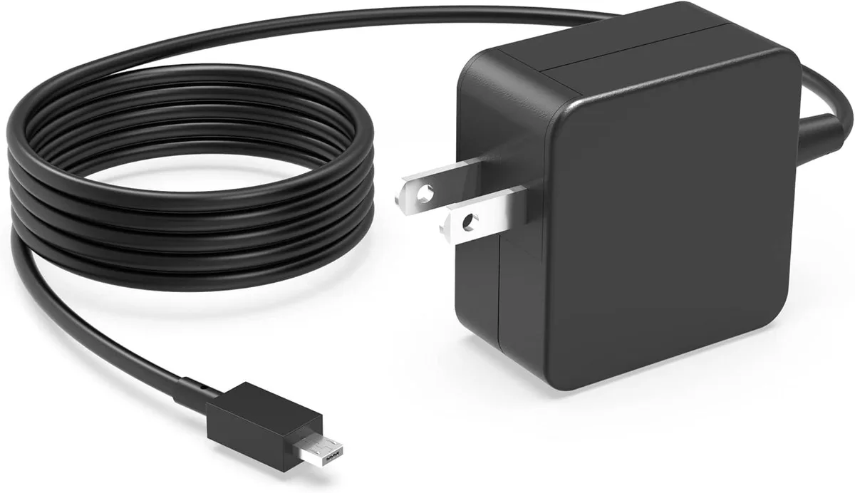 Compact black AC adapter with detachable mains lead and barrel connector