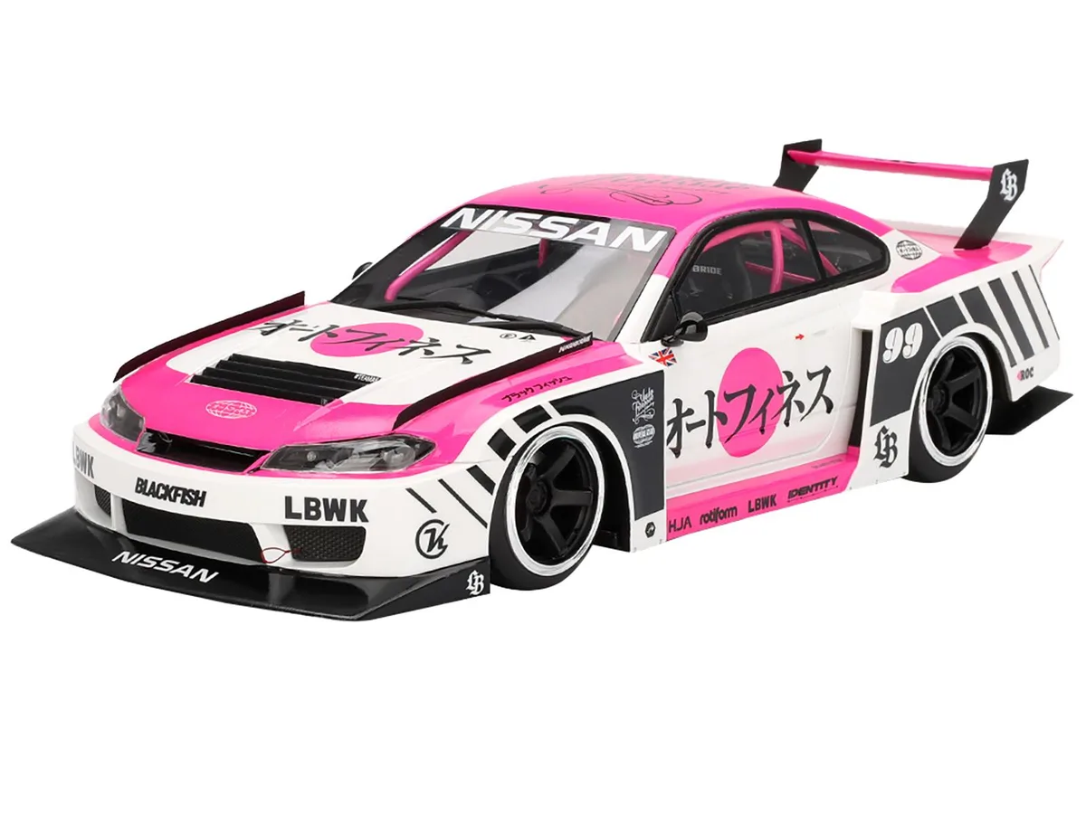White and pink 1/18 scale Nissan S15 Silvia model car with detailed interior and rubber tires