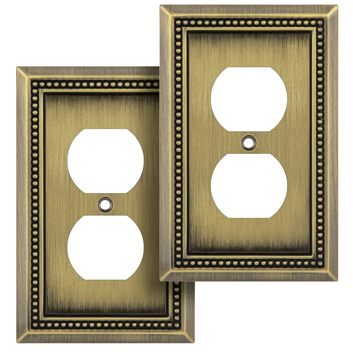 Two rectangular antique brass switch plates with beaded edges and matching screws