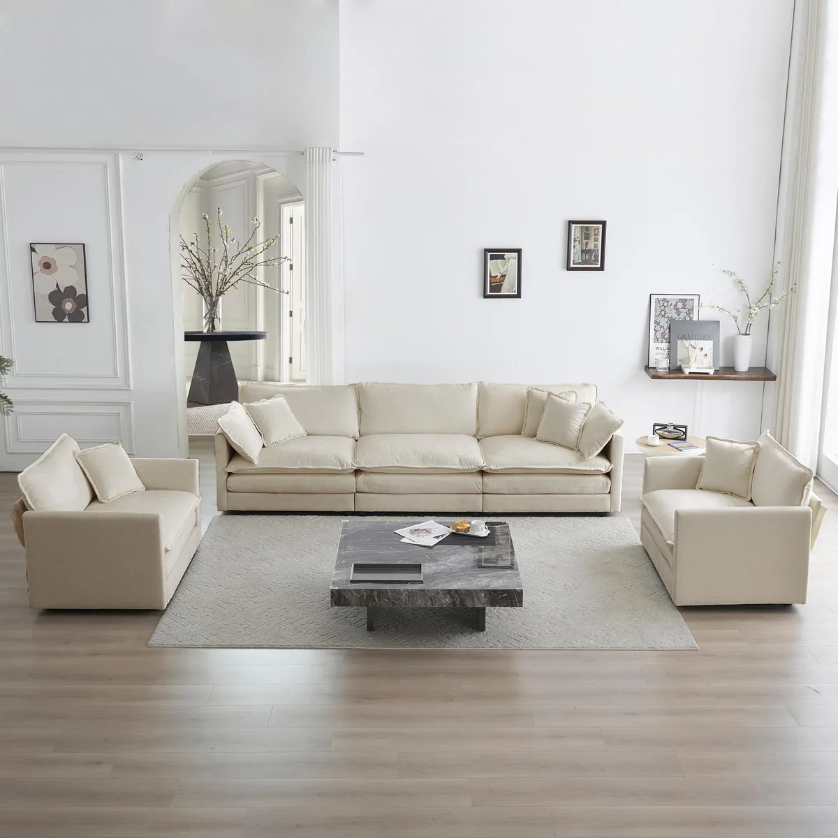 Three-piece beige chenille sofa set with round arms, one three-seater and two accent chairs