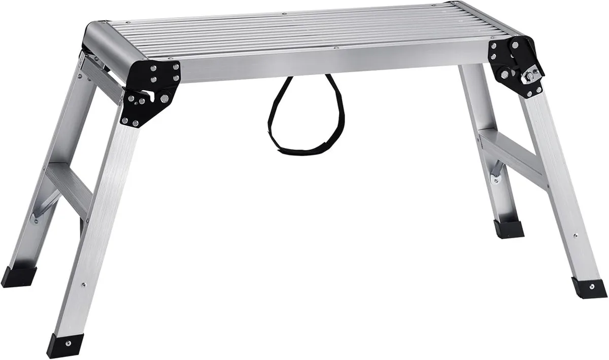 Silver aluminium folding work platform, rectangular top with four splayed legs and non-slip feet