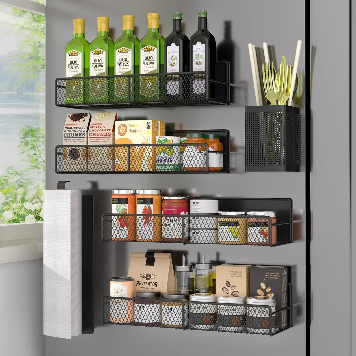 Six red magnetic spice racks and accessories on a metal surface