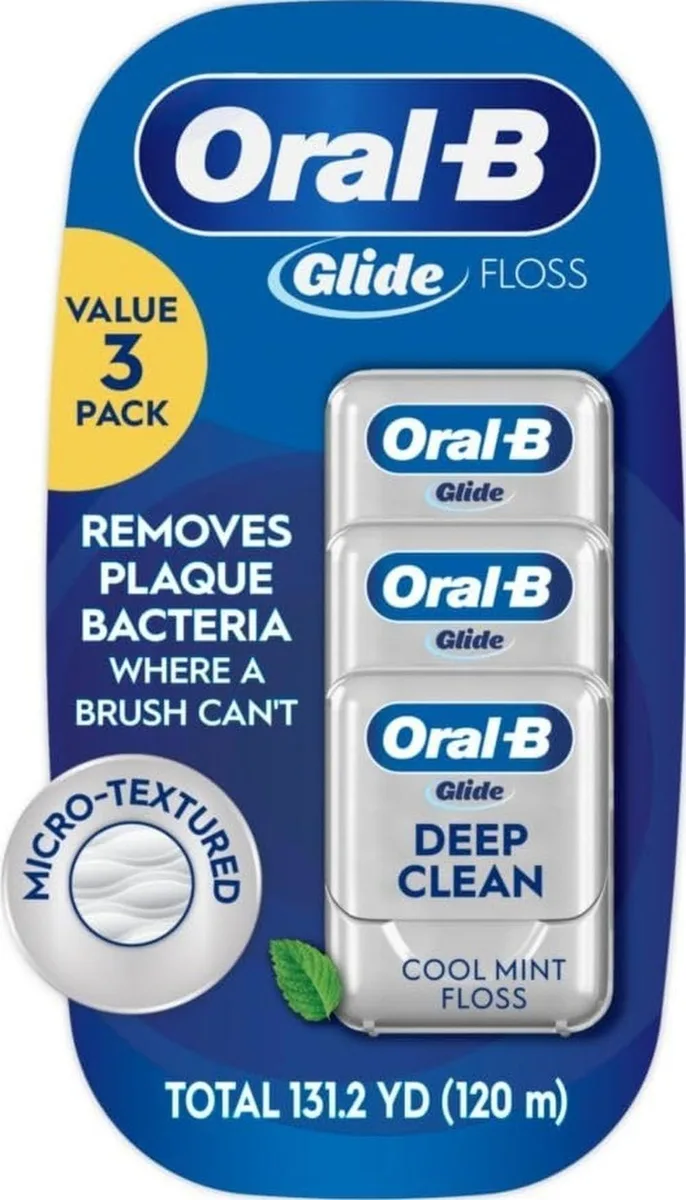 Three white floss dispensers in a pack, each 40 metres cool mint floss