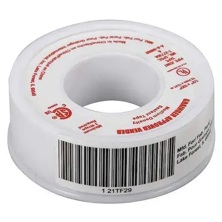 White PTFE thread sealant tape on a half-inch wide spool