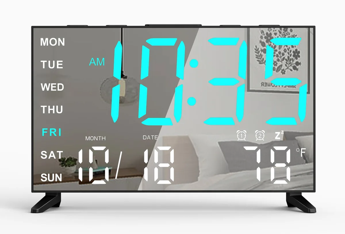 Black rectangular mirror clock with ice blue digits, triangular base