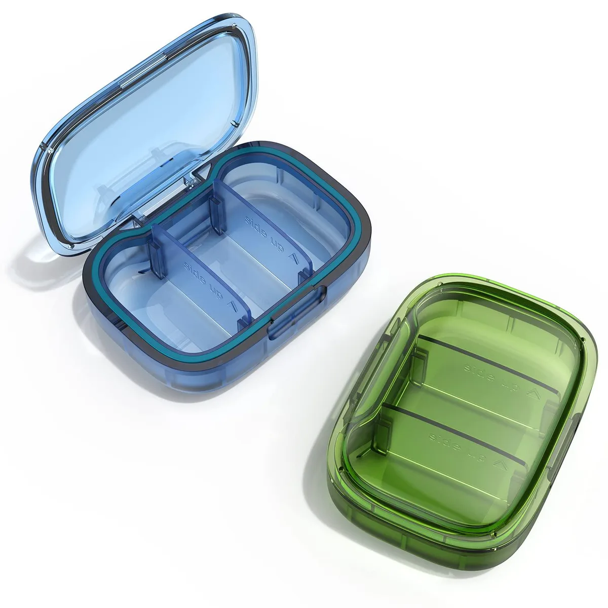 Two green and blue plastic pill boxes with three compartments each