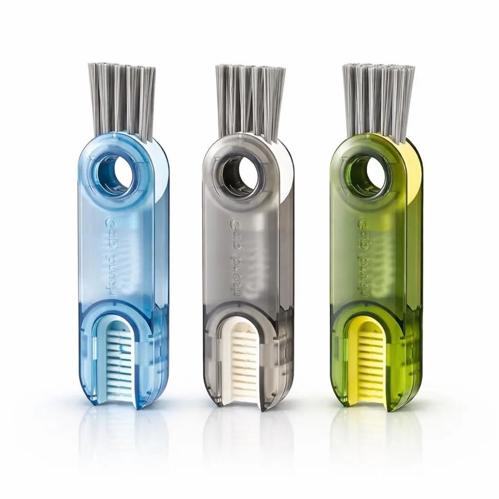Three folding lid brushes with a straight straw brush, white plastic handles, coloured bristles