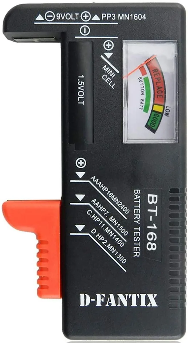 Compact rectangular battery tester with analog needle display and color-coded scale, tests multiple household battery sizes