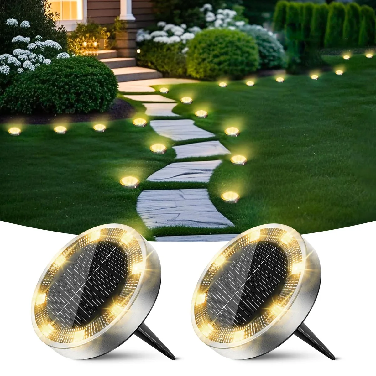 Two flat stainless steel solar discs with warm white LEDs, spike bases, polished brushed finish