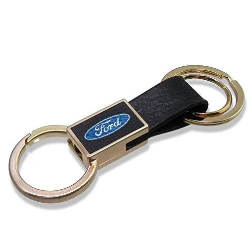 Black leather key fob with gold metal block, double rings and carabiner hook