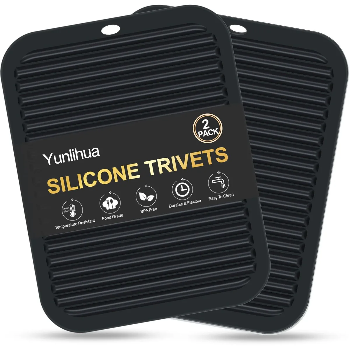 Two black rectangular silicone trivets with wavy raised stripes