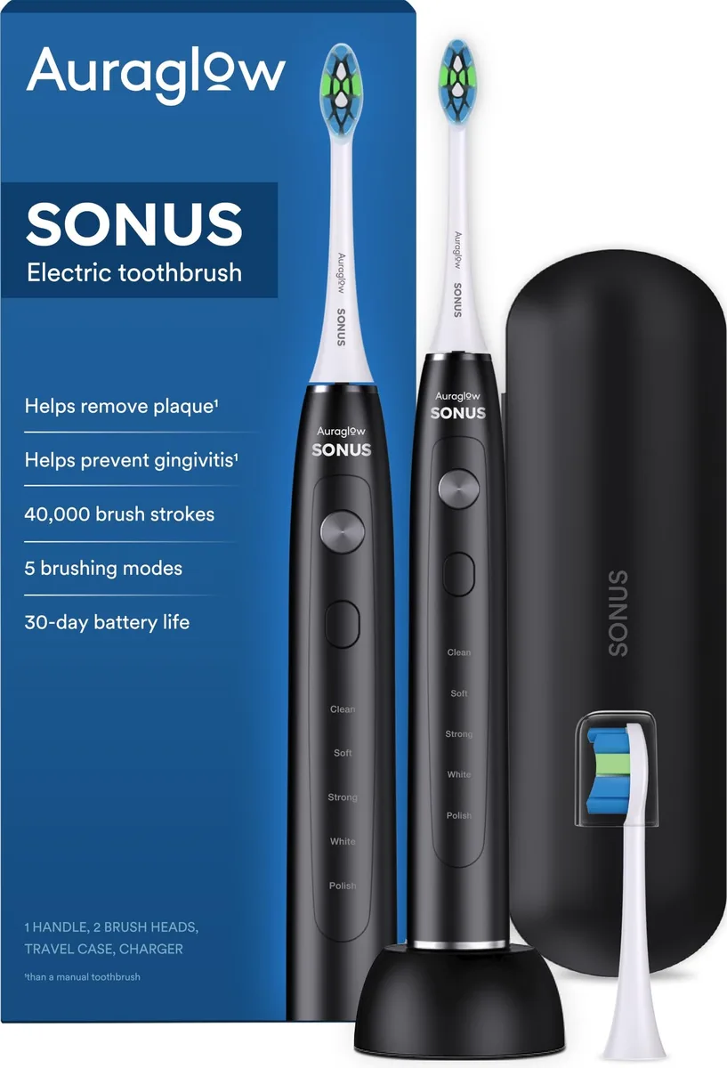 Black sonic electric toothbrush with wireless charging pad and travel case