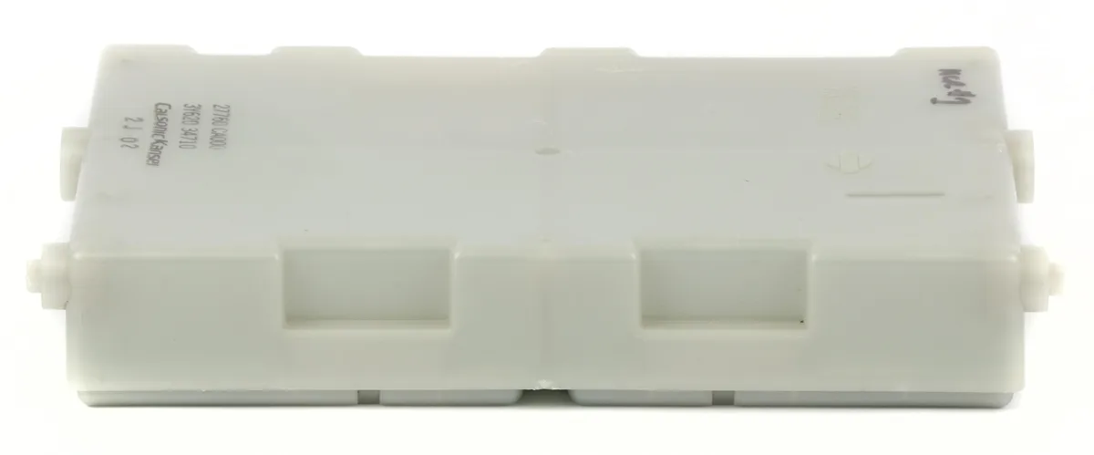 Rectangular automotive climate control module with buttons and display window, dark grey plastic finish
