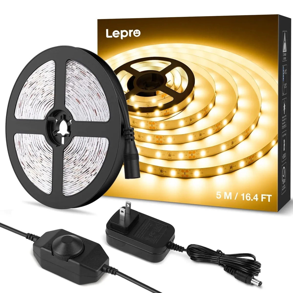 White flexible LED strip on a reel, 16.4ft long with 300 warm-white diodes and adhesive backing
