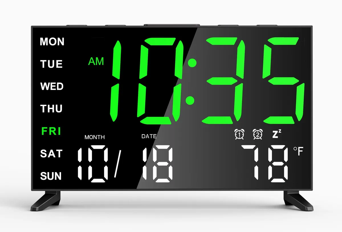 Black rectangular mirror clock with green digits on a triangular base