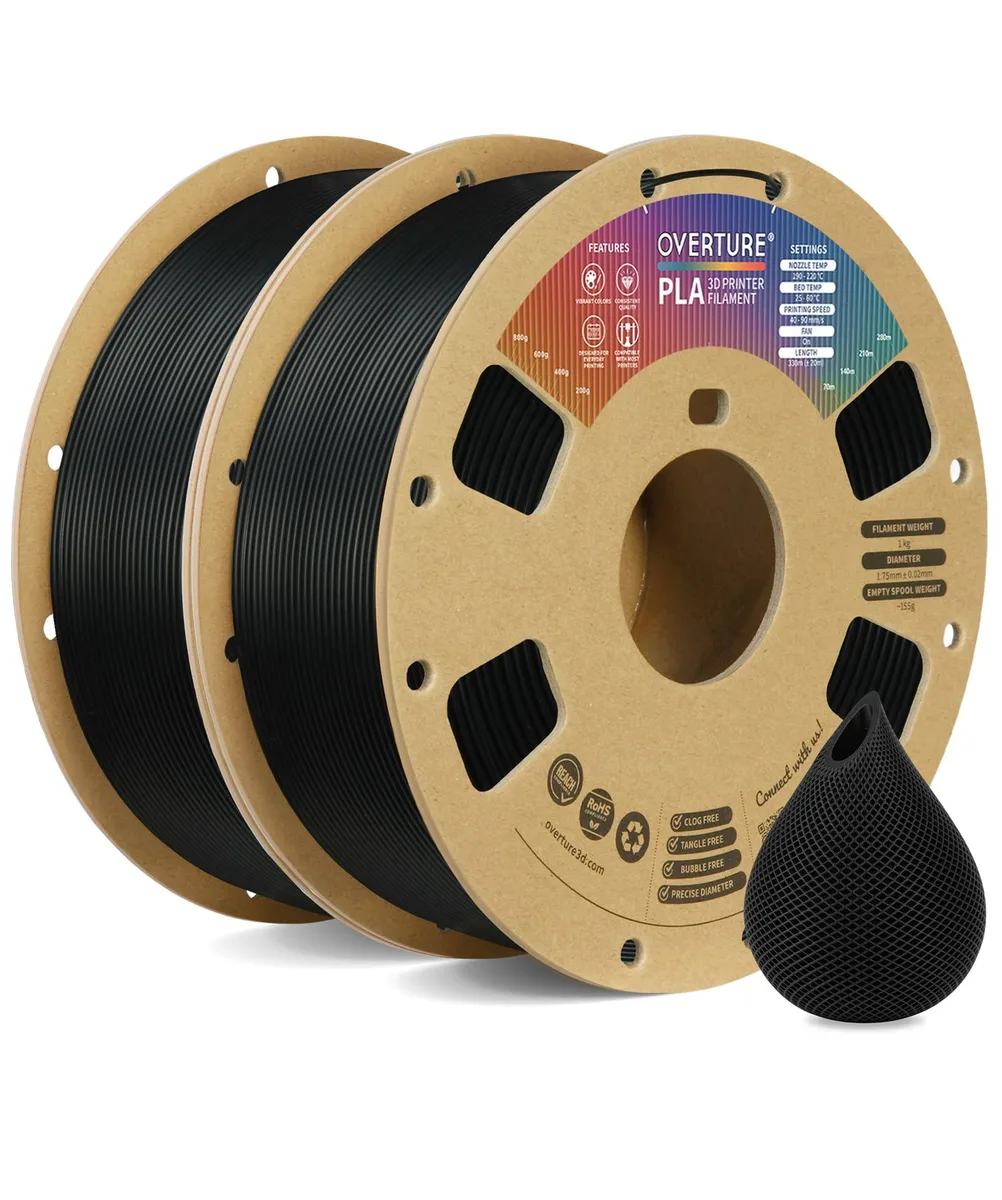Two black PLA filament spools on cardboard reels