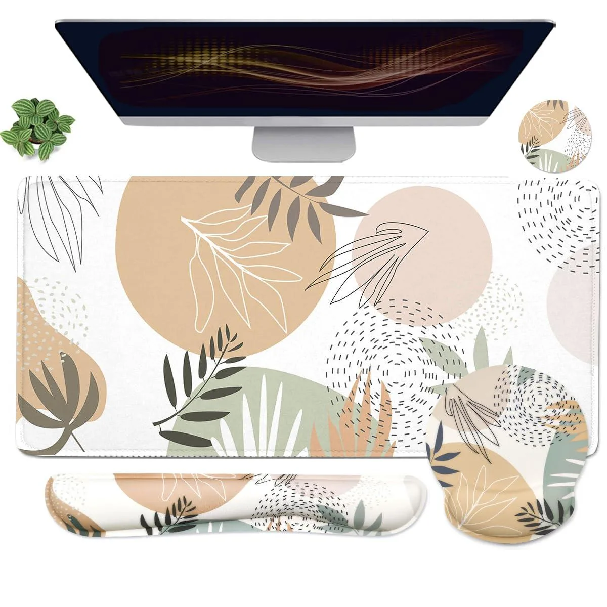 Black desk mat with matching keyboard wrist rest, mouse wrist rest and square coaster, all with plant pattern and stitched edges